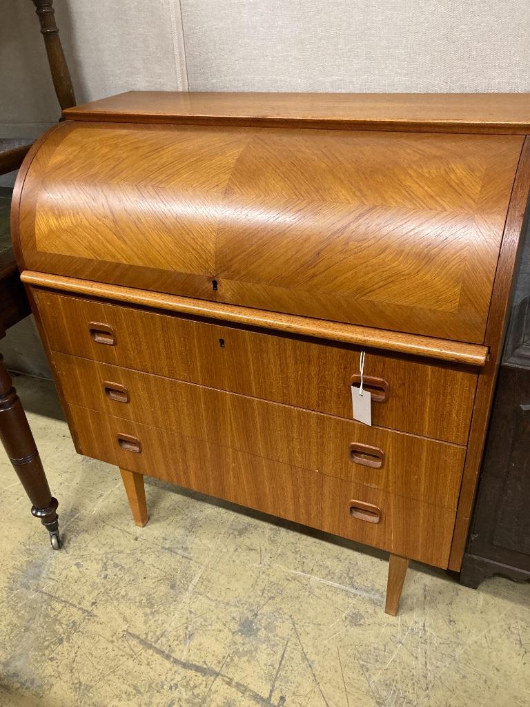 A teak cylinder bureau, length 89cm, depth 47cm, height 96cm